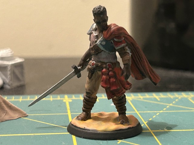 A miniature swordsman fully painted.